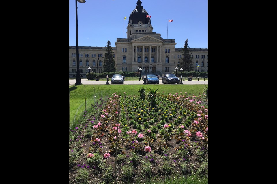 Visitors are encouraged to see the flower and plant displays at Wascana Centre in front of the legislature.
