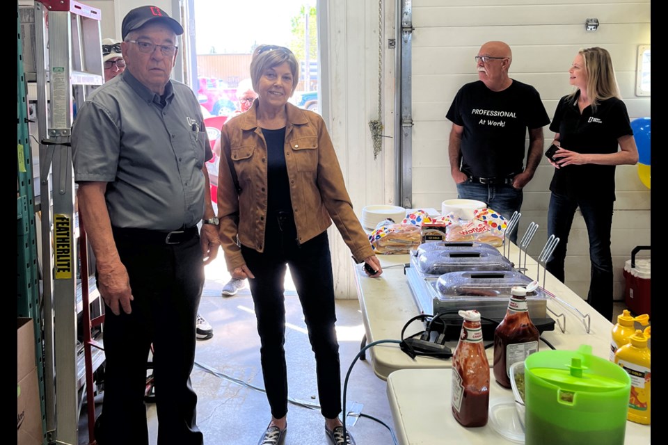 Lyle Erfle, Janice Erfle, Jim Cranfield and Jen Hinds among food, friends, family and colleagues as they celebrate the man of the hour, Monday.