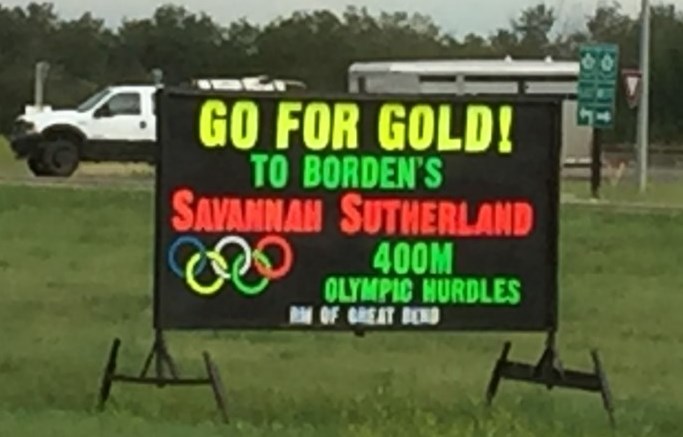 Billboard sign along Highway 16 at Borden cheering on Savannah Sutherland.