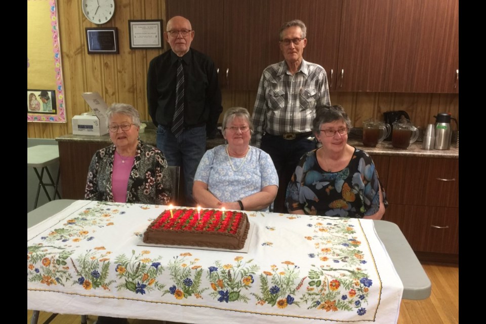 Borden Friendship Club members celebrating April birthdays are: back row - Bob Wardhaugh and Ed Neufeld; seated - Irene Hamp. Mary Thiessen and Velora Friesen. 