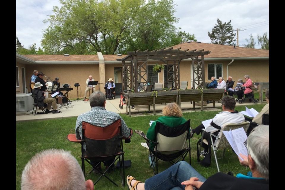 An outdoor church service was held at Borden Care Home June 2, featuring Celtic Country.