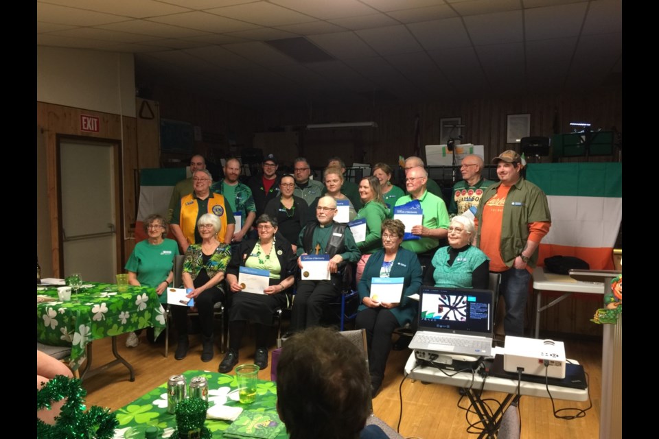 Newly inducted Lion members and their sponsors at a ceremony held March 18 in Borden Seniors’ Room.