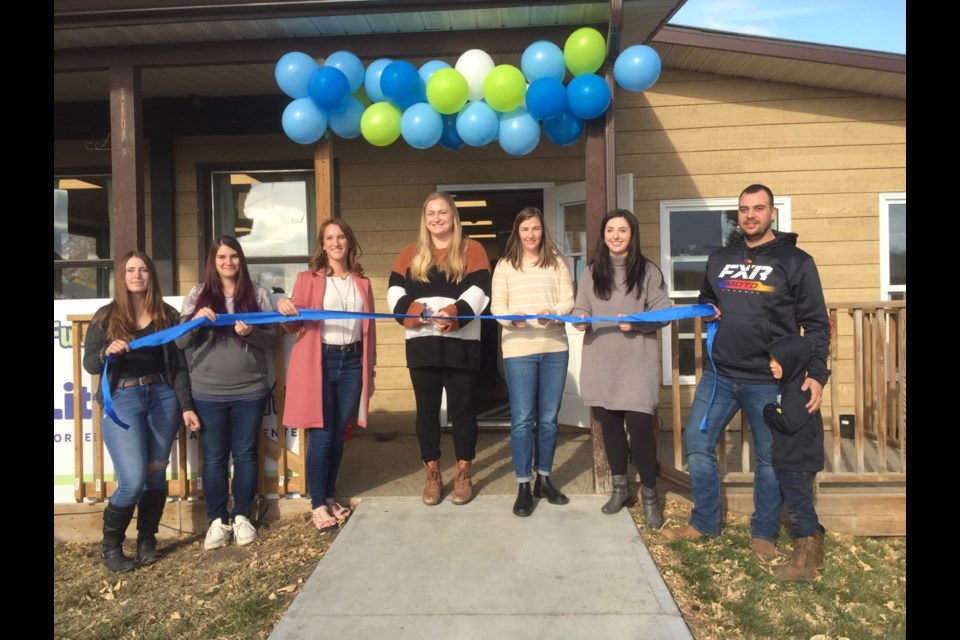Members of the Little Sprouts Early Learning Centre cut the ribbon Oct. 22 to officially open the facility. 