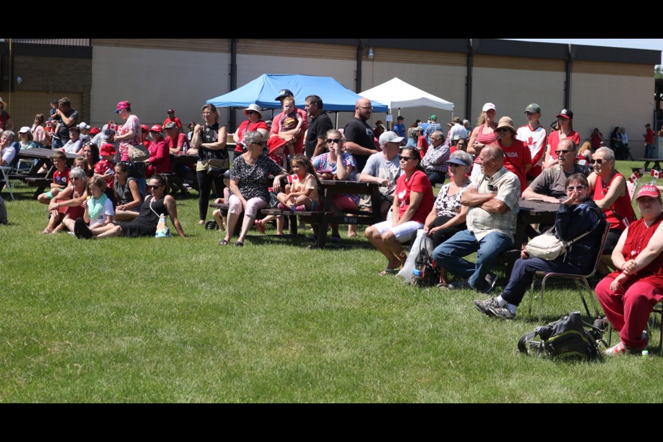 Many simply relaxed in the sunshine and watched the entertainment.