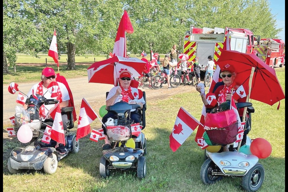 The scooter trio of Judy Rhinehart, Joyce Orange and Irene Olson were awarded third place in the bicycle/scooter category of Maidstone’s Canada Day parade.