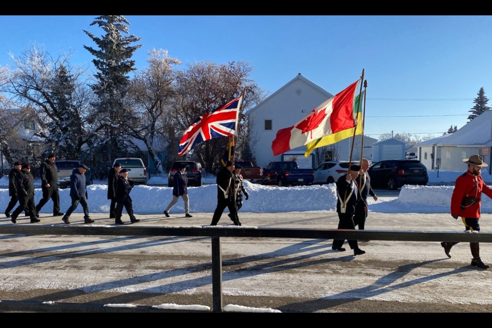 Legion members marched from the Cut Knife Community Centre to the Elks Theatre for the Remembrance Day Service. They were led by an RCMP officer and followed by some local volunteer firefighters. 