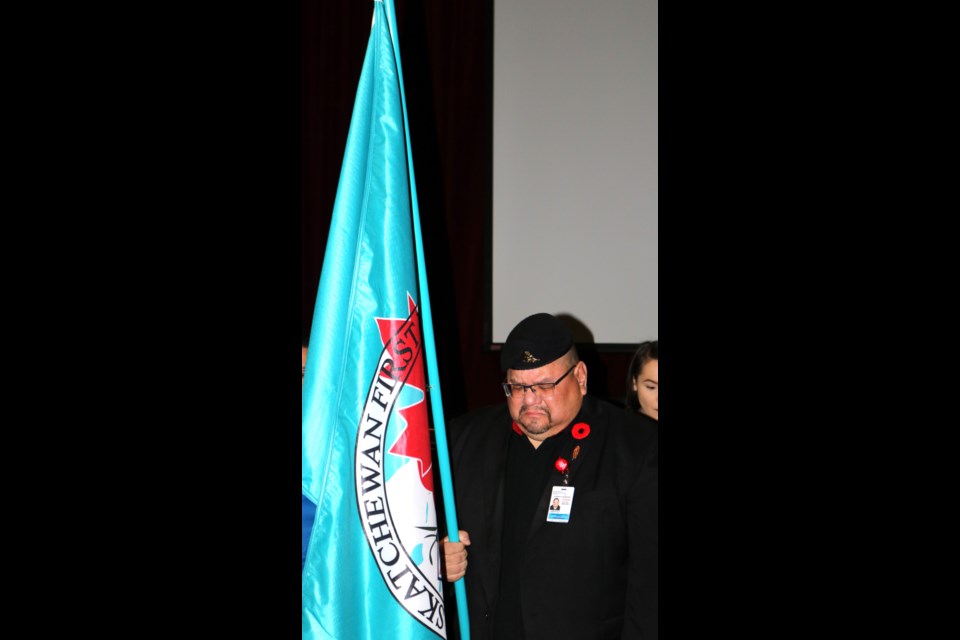 Joe Whitehawk was one of the flag bearers Wednesday.