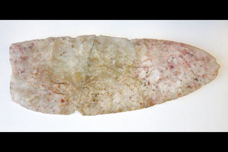 Folsom Ultrathin Biface on heat-treated Swan River Chert from the Sarazin Collection, Rocanville and District Museum. Photo taken January 15, 2019, Royal Saskatchewan Museum Annex (Thomas Richards). The biface is 13.6 cm long.