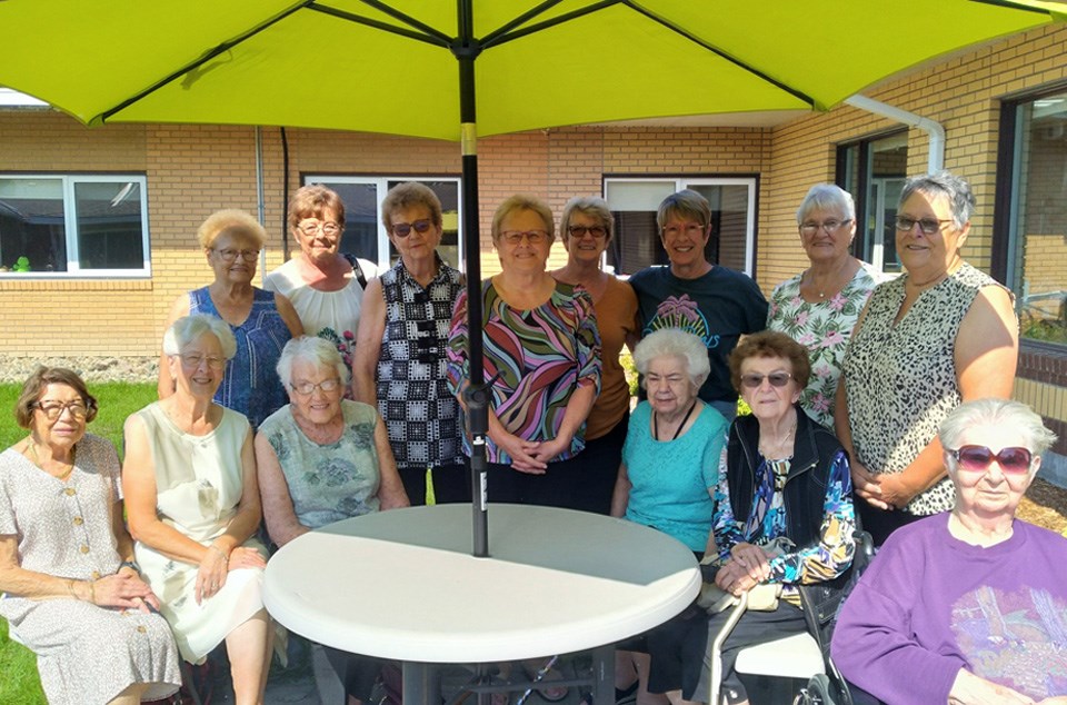 Members of the Kamsack and District Nursing Home auxiliary who attended the auxiliary’s 50th anniversary celebration at the home on Aug. 27 were: standing - Olga Kiwaluk, Doreen Chorney (president), Joyce MacLean (vice-president), Joanne Zarchikoff (secretary), Donna Krawetz, Dot Davies, Pat Shotenski and Florence Bielecki; seated - Betty Andrychuk, Bernice Makowsky, Adeline Nykolaishen (treasurer), Elaine Krasnikoff, Eileen Chutskoff and Mary Filipchuk. Laurene Achtymichuk, Fran Bowes, Colleen Bernard, Bev Scobie and Linda Scobie were not available for the photo.