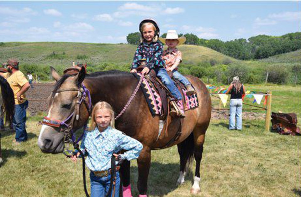 Some scenes from last year’s Wawota Heritage Day, including the kids' rodeo, petting zoo, cotton candy and the band Ragged Edge.