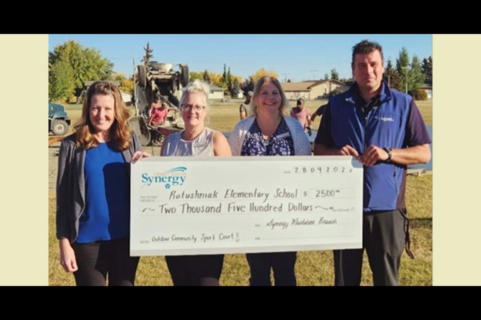 
Synergy Credit Union makes a $2,500 donation to Ratushniak Elementary outdoor sports court.
