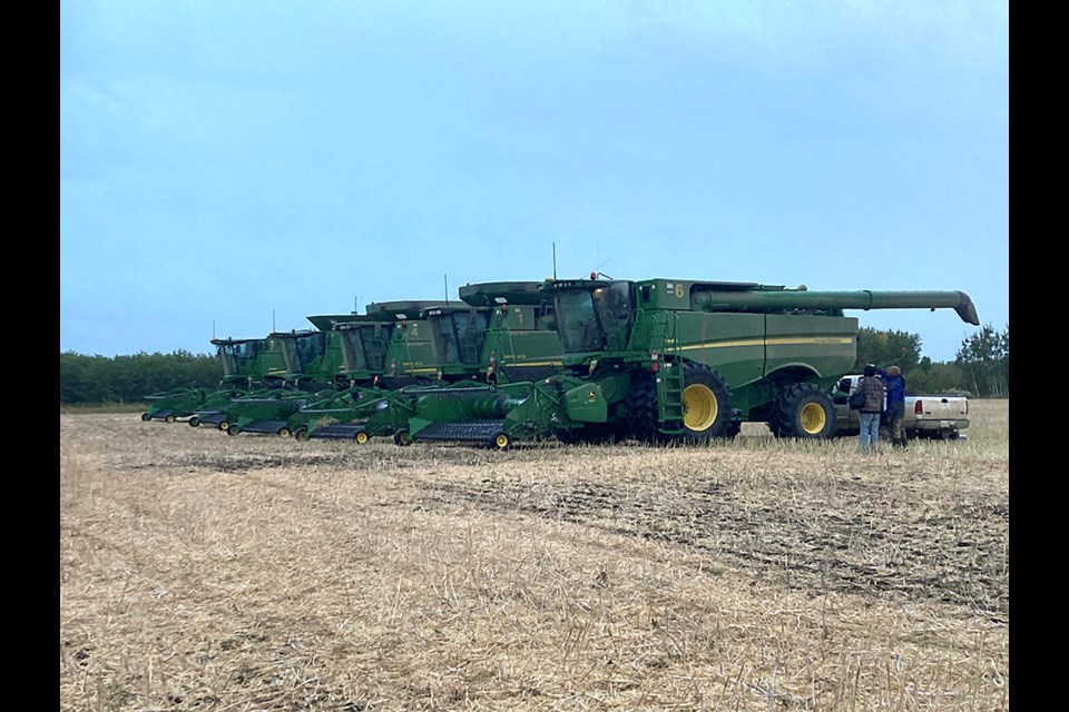 Our combines along with third son Ryan’s will be sitting idle for a few days as rain brings harvest to a halt. It’s been dusty, so these machines will get a thorough washing. 