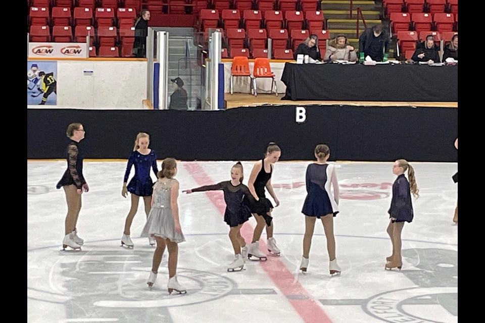 Some of the Battlefords figure skaters warming up before another Sunday competition. 