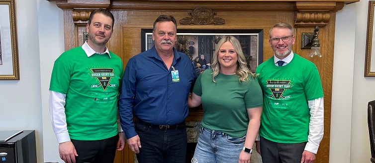 In the photo are MLA Tim McLeod, Raymond Deck, Jenna Lockert and MLA Everett Hindley. Lockert attended the Legislature to promote donation and speak about her experience as a living organ donor.
