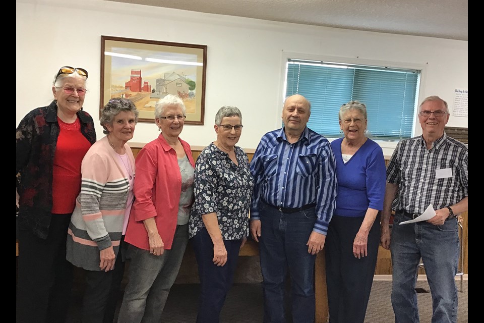 Linda Ard and Carol Dyck won first place at the Do Drop In shuffleboard tournament May 15. Second were Arlene Walker and Karn Kelly and third were Gordon Klein and Maureen Campbell. Also in the photo is organizer Nestor Fransoo. 