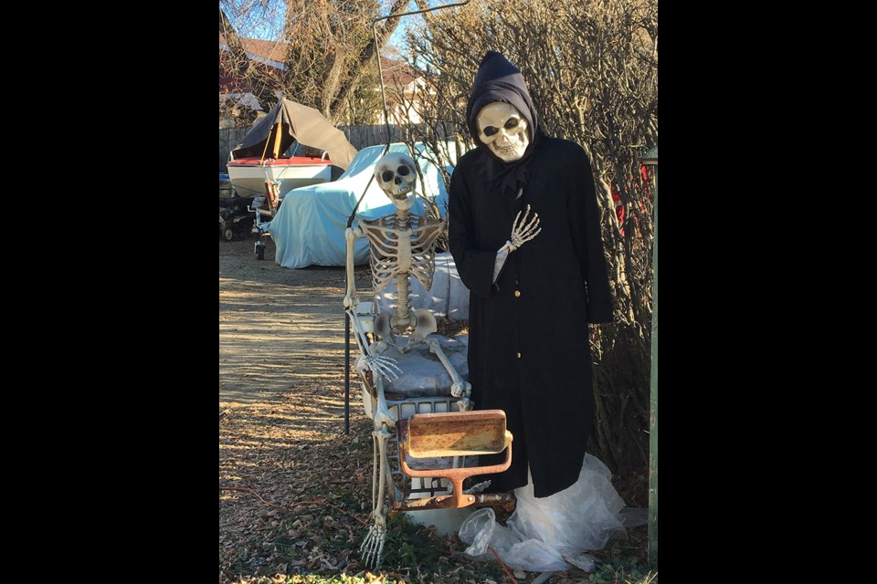The Soucess family's Halloween display also included some Armistice themes. 