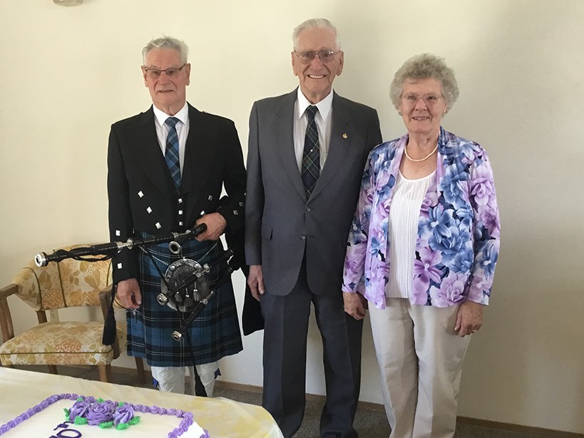 Walter Tait (centre) was guest of honour at a birthday celebration in Meota July 9. He is flanked by longtime friend Jim Ramsay and wife Mary. 