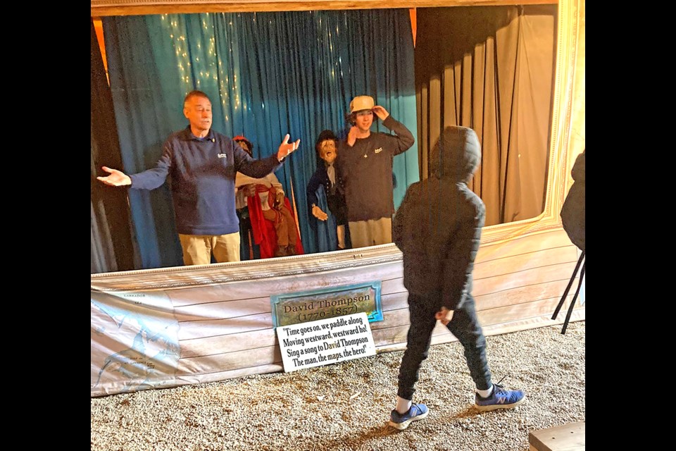 A puppet show depicts the role of David Thompson in mapping a route through the Canadain Rockies.