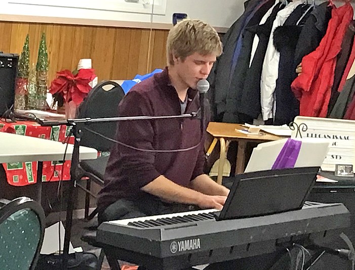 Keegan Isaac of Prince entertaining at the Do Drop In seniors’ supper, Dec. 4.