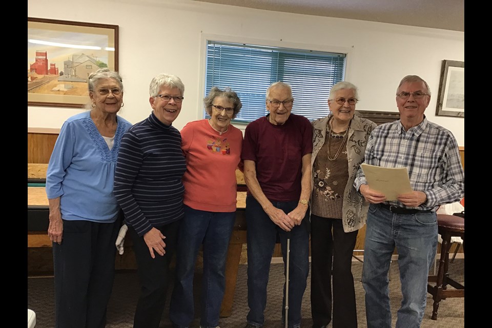 Placing at the top of the Do Drop In shuffleboard tournament were Maureen Campbell, Donna Lambert, Cora Christiansen, Linda Ard and Svend Christiansen. They are pictured with tournament organizer Nestor Fransoo. 