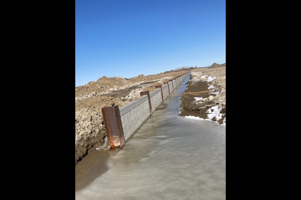 The walls of the new marina being constructed at Jackfish Lake are composed of heavy 20-foot wide flange posts interlaced with cement panels. 