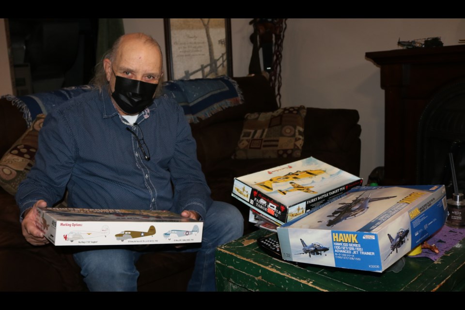 Will Woods has a 'stash' of model airplanes still to construct.