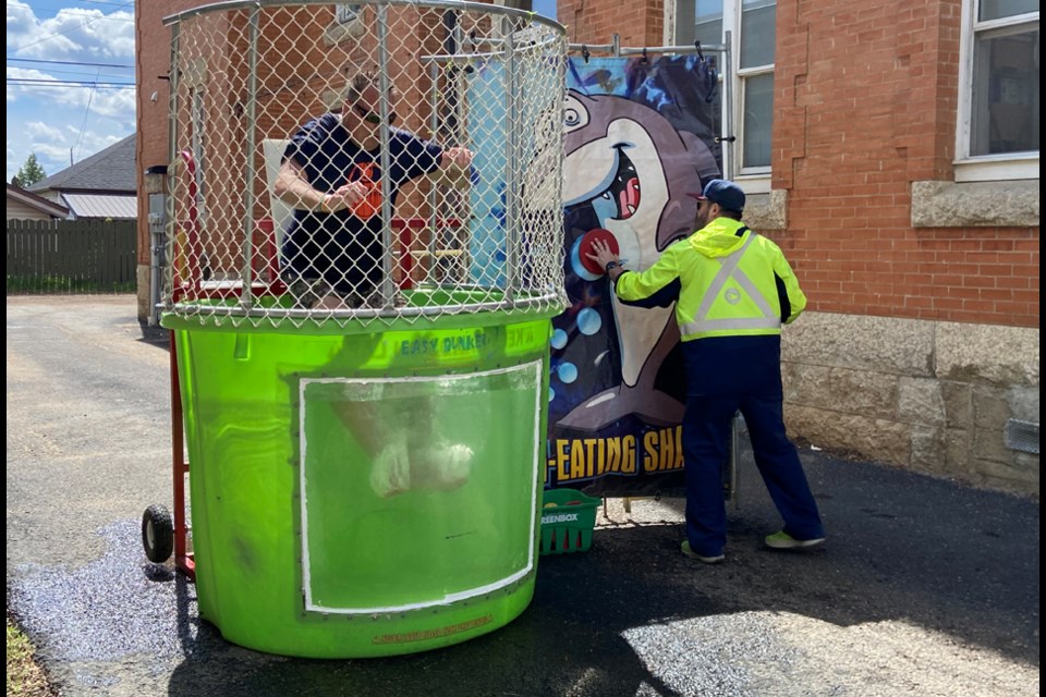 Gene, North Battleford supervisor, getting a summer splash in the dunk tank.