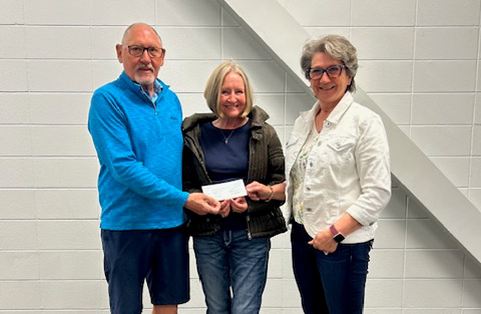 Al Gabert, chair of the 2024 SSFA 55+ Provincial Games held in the Battlefords, presents a cheque of $5,000 to Cheryl Myers, chair and Cecilia Leibel, treasurer for the SSFA Rivers West District. 