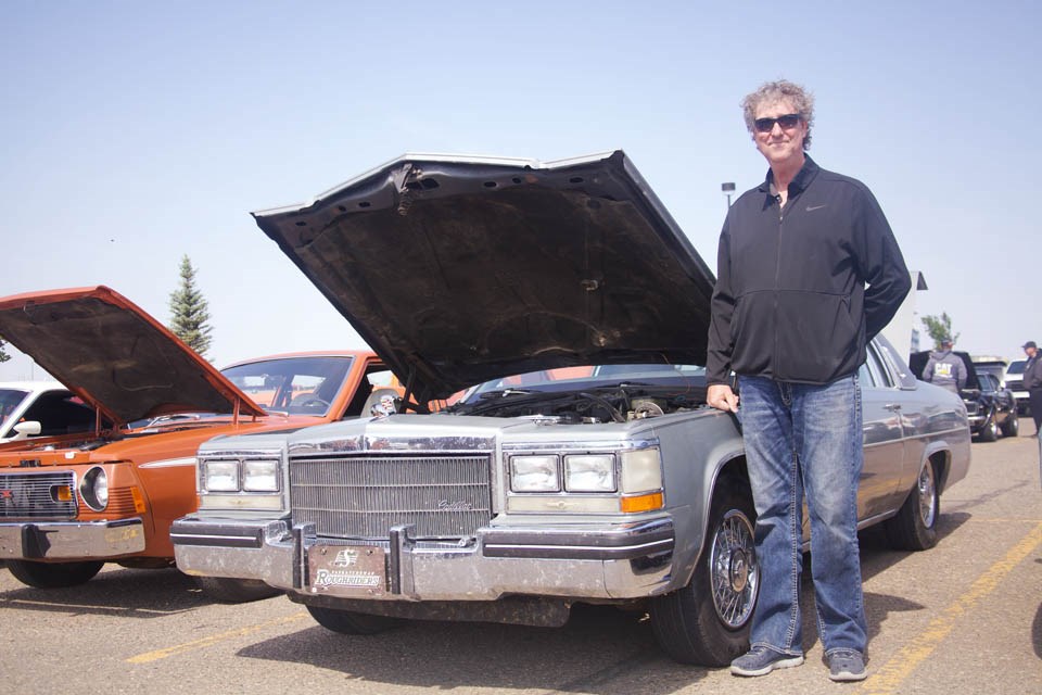 Participants in Guitars and Cars Show and Shine.