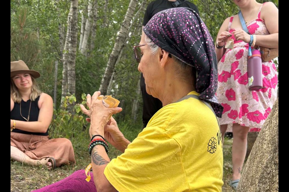 Yvonne Morin took us on a nature walk through the forest. She is originally from Pelican Narrows but has resided in Saskatoon for many years. Morin and her sister create herbal remedies and sell them throughout western Canada. I was excited to have met this interesting lady because I learned so much from her rather than browsing through my many herbal books and I'm not exactly sure if I could believe if all is a true resource. | 