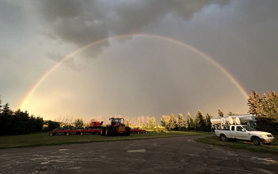 A perfect rainbow among the heavy grey clouds on our farm last Thursday at 7:30 p.m. 