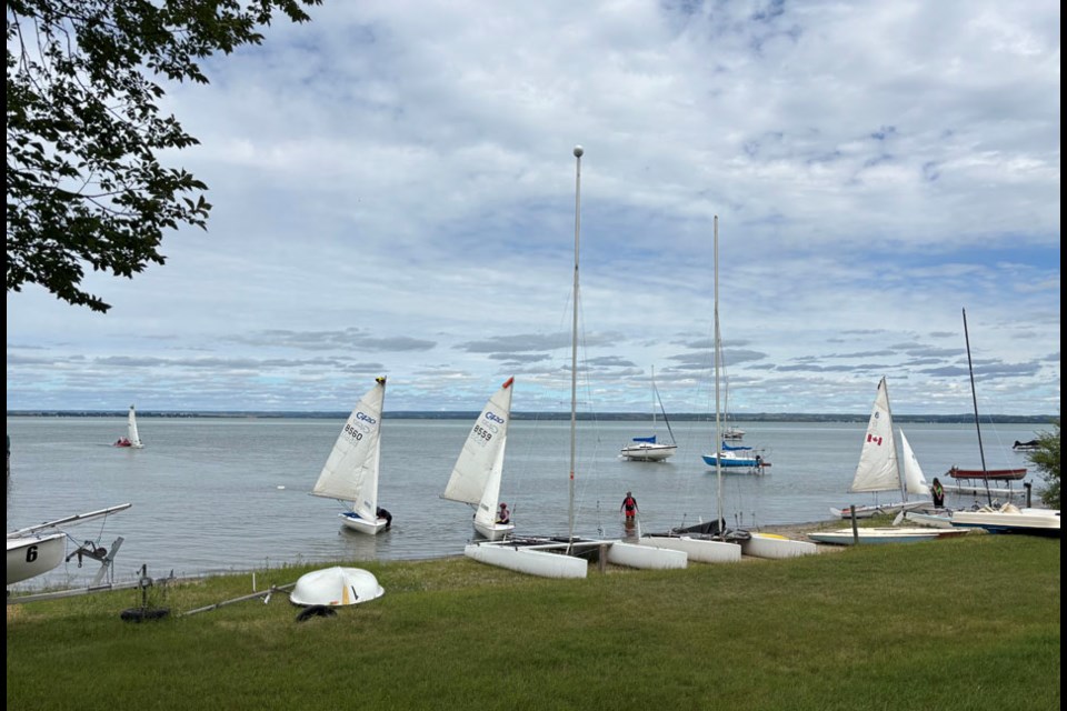 Sask Sail teaches sailing on 420’s which are a two-person boat. Eventually students will be taking out Meota’s Lazor One sailboats or a Catamaran. Once you’ve learned to sail, there is equipment available at the clubhouse that members can take out. I noticed this year that not only were students wearing lifejackets, several were also wearing helmets. 