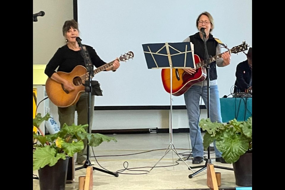 Val and Fran entertain at Paynton’s rhubarb festival.