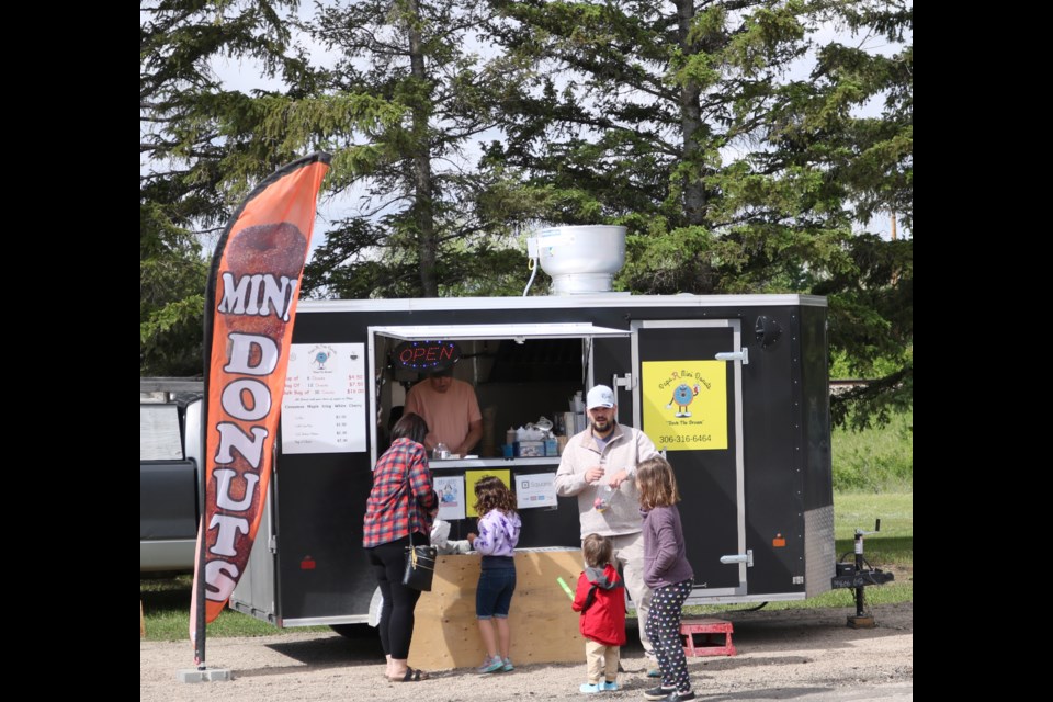 The day kicked off with street vendors and a community parade.
