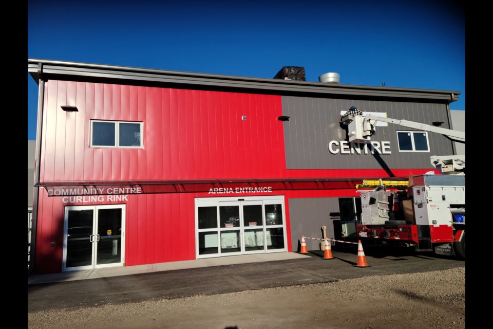 New signage was one of the final finishing touches on Unity Community Centre arena which has been awarded Recreation Venue of the Year, Renovated or New, by Rivers West Sports, Culture and Recreation.