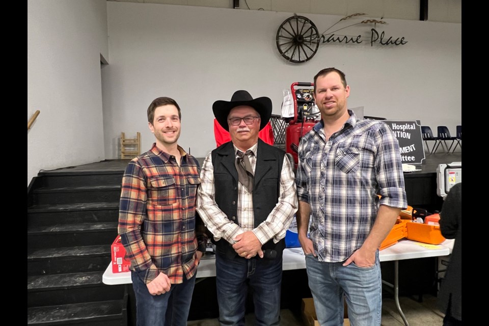 From left, president Randy George, auctioneer Scott Bryce and MC Devin Brown were kept busy throughout the 19th annual fundraiser for the Moose Mountain Wildlife Federation. 