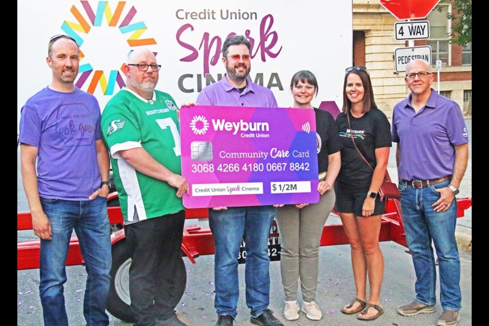The Weyburn Credit Union unveiled their pledge of $500,000 over 15 years for the naming rights to Weyburn’s new theatre, to be named the Credit Union Spark Cinema. From left are Sean Purdue, Corey Morrissette, Ryan Janke, Laila Bader, Monica Osborn and Jeff Richards, chair of the board of the Weyburn Credit Union.