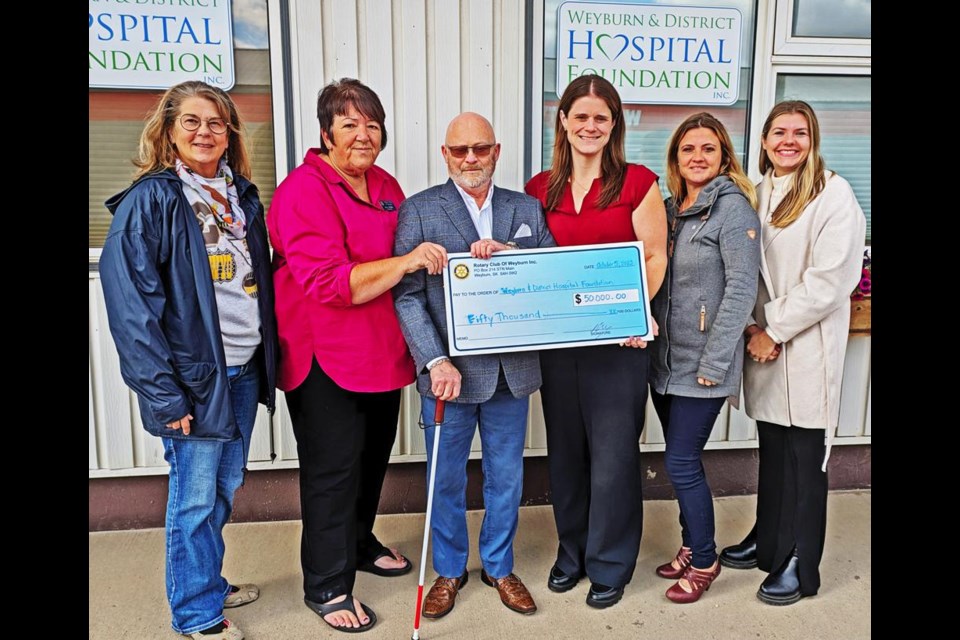 Representatives of the Weyburn Rotary Club delivered their pledge of $50,000 to the Weyburn and District Hospital Foundation on Thursday for the new Weyburn hospital currently under construction. From left are CJ Mainil, hospital foundation; Rotary president Jill Thorn; Rotary member Duane Schultz; and foundation board directors Stephanie Schmidt, vice-chair Melissa Swayze and Amanda Bartlett.