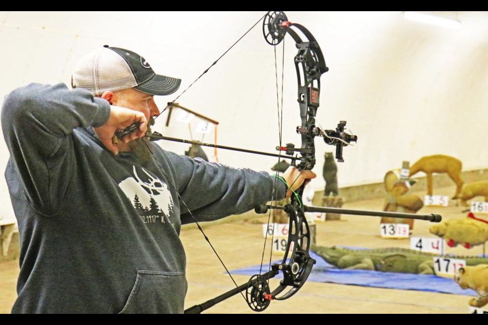 Chris Dunne lined up a target at the 3D archery shoot held by the Weyburn Wildlife Federation at the Goodwater Rink in 2022.