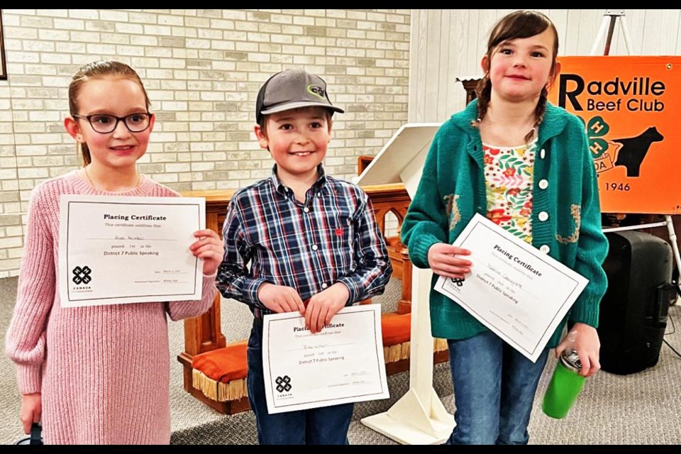 In the District 7 speech contest, for Cloverbuds, first place went to Eva Muxlow (Radville Beef Club) left; second was Madeline Cascagnette (Lomond Light Horse Club), at right; and third was Riley Wilson (Pangman-Ogema Beef and Sheep Club).