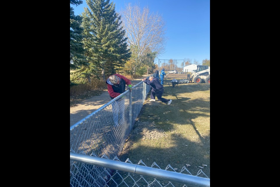 Members of the Carlyle and District Lions Club were busy recently, fencing the Number 6 Ball Diamond. All six diamonds are now fully fenced in Lions Park. Dugouts and the yellow fence capping will be added next spring.