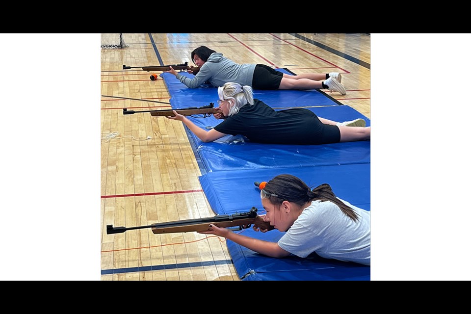 Three Kamsack air cadets who were on the mat together shooting at a target during biathlon training on Sept. 24 are sisters, from top: F/Sgt. Sage Tourangeau, Capt. Halo Tourangeau, and Cadet Collins Keshane.