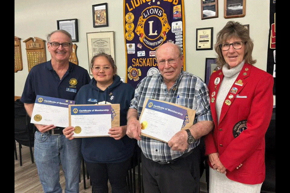 The Carlyle District Lions Club recently inducted two new members. From left, sponsor member Gord Paulley, new members Lynn Alvarex and Reg Newell, and district governor for СƵ Saskatchewan Heather Vermeersch.
