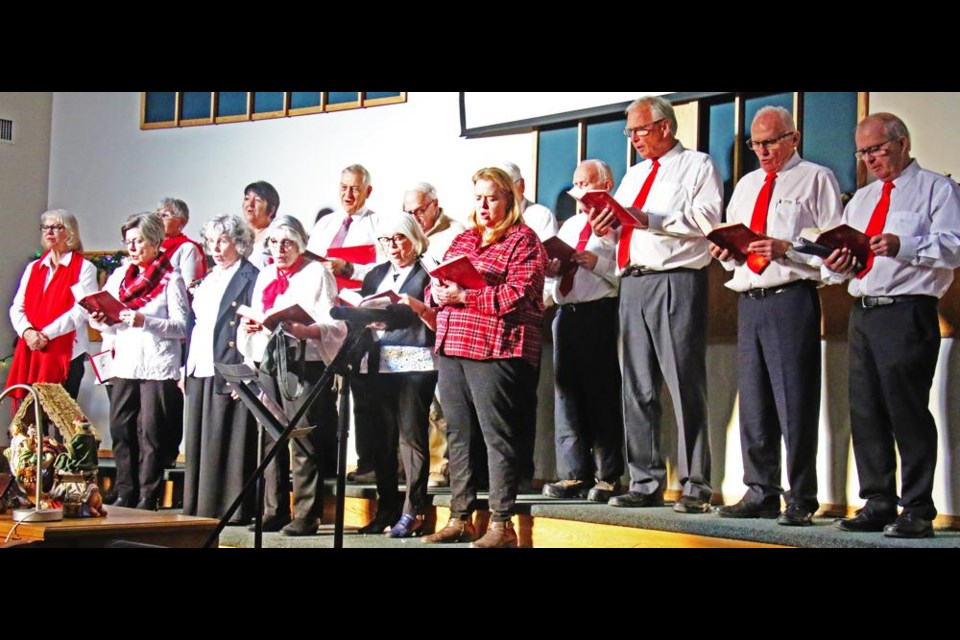 The Weyburn Rotary Club and spouses gathered on stage for the community singing to start the Carol Festival, and also performed during the afternoon program on Sunday.