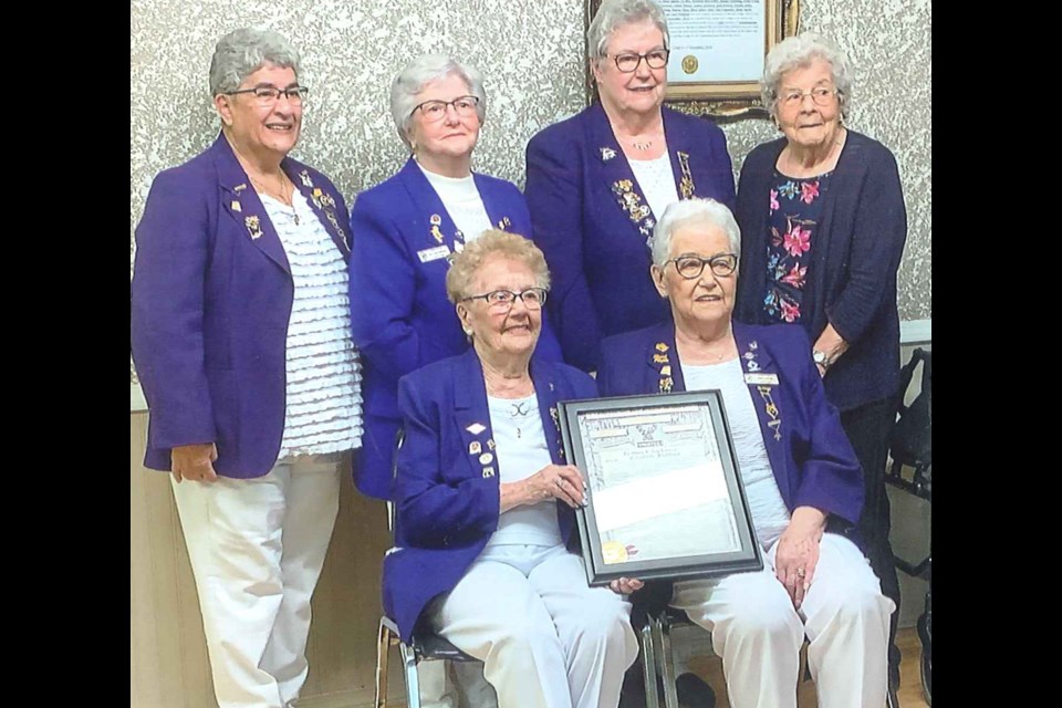 Charter members of Unity's Royal Purple, who remained members in the club for 54 years are (back row) Sharon Olsen, Pat McCubbing, Elaine Sperle, Doreen Leslie, (front) Jeanne Cumming and Irene Acton. Missing is Sophie Hayward.