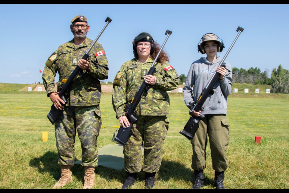 Cadet Akara Reeves, right, of the No. 2901 Royal Canadian Army Cadets Corps in Estevan was selected to participate in the ceremonial first shot on the 100-yard range. Also in this photo are Chief Warrant Officer Pat Rizzo and Lieutenant-Colonel Arleen Miller, the commanding officer of Connaught CTC. 