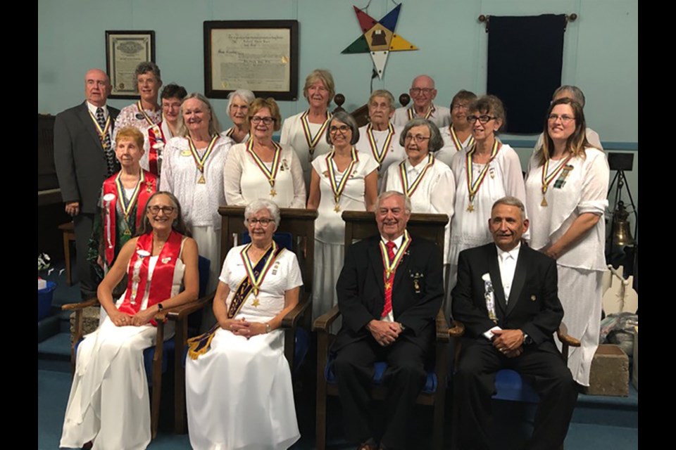 On Aug. 20, Worthy Grand Matron Cheri Cowan of Assiniboia and Worthy Grand Oatron Rick Gallaway of Prince Albert of the Grand Chapter of Saskatchewan visited Hiawatha Chapter No. 47 for the Chapter’s last official visit. Attending the meeting, from left, were: (back row) Roderick Lee of Yorkton, Angela Oleskiw, Melinda Nagy of Regina, Marjorie Orr, Sally Bishop, Macine Greiner of Yorkton, Earl Greiner of Yorkton, Cathy Toth of Yorkton and Kathy Gordon of Yorkton; (second row) Gladys Lehtisaari of Esterhazy, ruby Lee of Yorkton, Nancy Leson, Susan Bear, Kathleen Achtymichuk, Milena Hollett and Angela Bothner, and front, Cheri Cowan (Worthy Grand Matron), Judy Stone (Worthy Matron), Stan Stone (Worthy Patron) and Rick Galloway (Worthy Grand Patron). All are of Hiawatha Chapter at Kamsack, except where noted. 