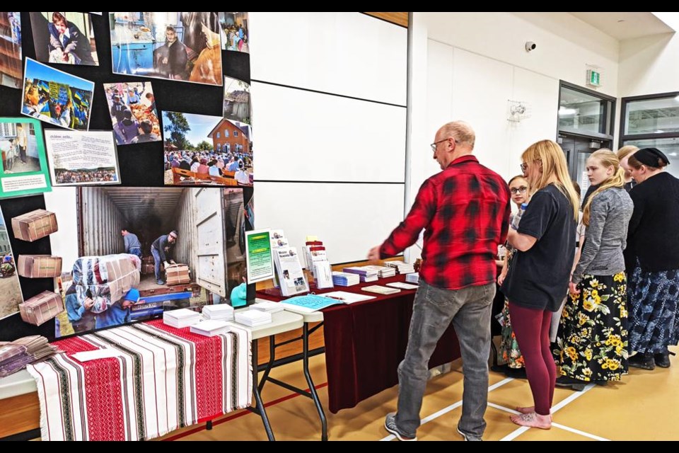 Residents had a look at a display of items and information from Faith Mission, following an info meeting on Sunday evening at the CU Spark Centre