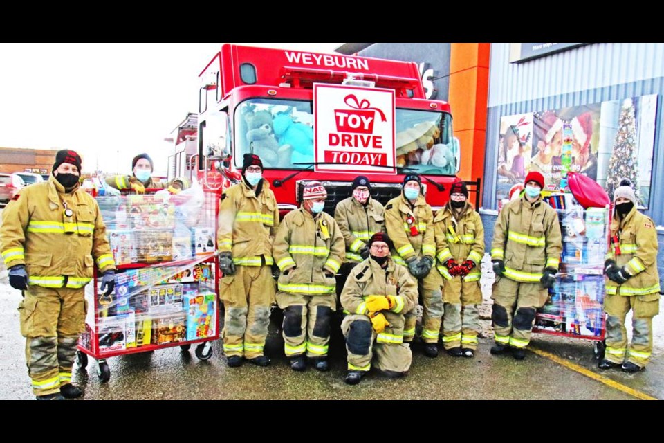 This was the Weyburn Fire Brigade around 1 p.m. Saturday, with the fire truck cab flled and two carts as well, all for the Family Place.