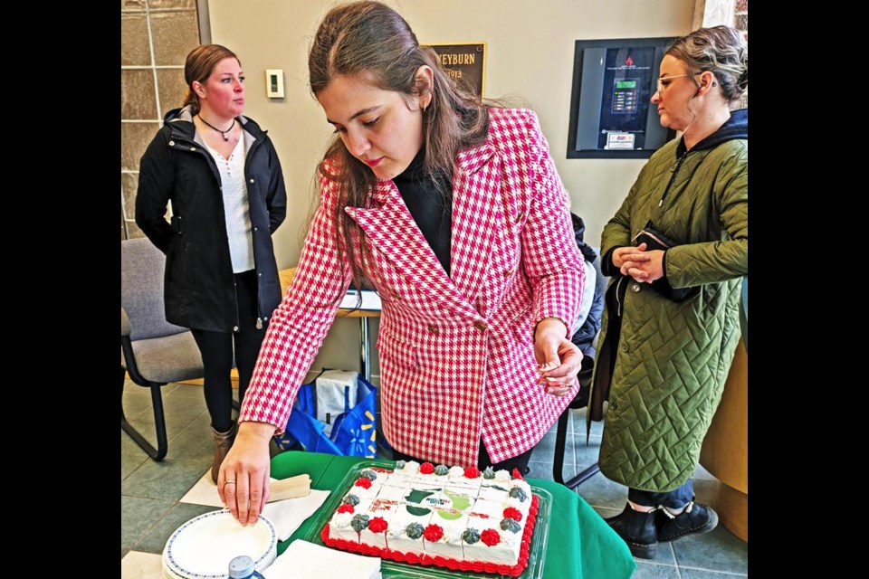 Deniza Blakaj Krasniqi, the new Settlement Advisor at 鶹Ƶeast Newcomer Services, served a special cake and coffee inside City Hall, following the flag-raising ceremony on Thursday morning to mark International Anti-Racism Day.